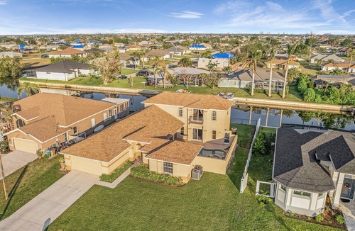 Cape Coral Villa | Fenced Yard & Pool · BBQ & Kayaks