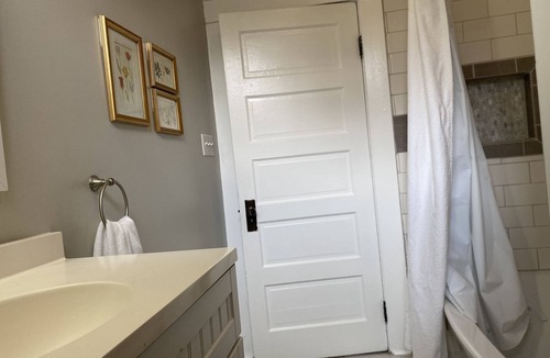 Elkridge House | Four bedrooms, porch and parking! Pet-friendly with a large fenced yard.