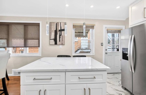 Northeast Condo | GORGEOUS HOME TUCKED AWAY IN GREENER PART OF TOWN