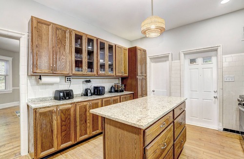 Gwynn Oak House | Hilltop Retreat w/Pool, Games & Sunroom