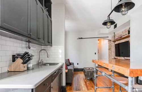 Truxton Circle Condo | Industrial Loft Offers Historic Feel Near Conv Ctr