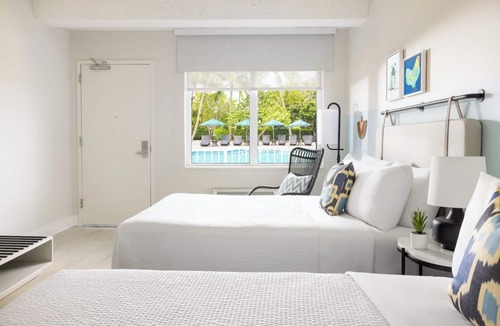 New Town Hotel | Kick Back in 3 Pool-View Rooms at Key West’s Blue Flamingo Resort