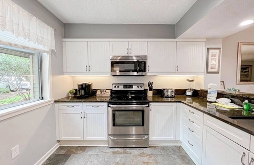 Arcadian Shores Villa | Kingston Richmond Pk 14B 1st floor w/pool & beach
