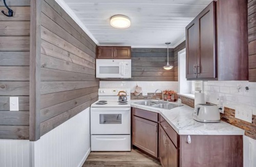 Montague Cottage | Lake Michigan Getaway for Two - King Bed - Beach Access