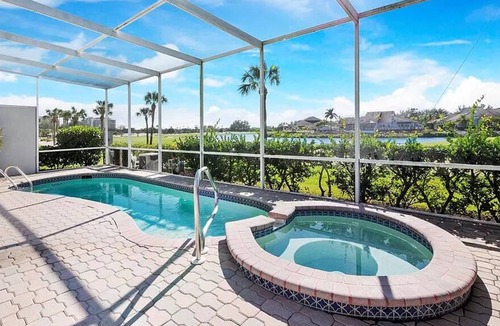 Bay Isles Villa | Longboat Key Oasis, golf course water views, pool, hottub