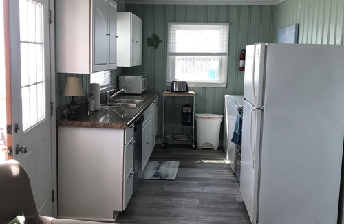 Long Beach Cottage | Lovely cottage, Ocean Front , small Dog friendly -150 one time fee oak island