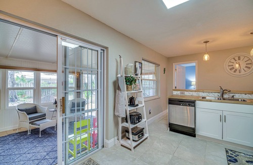 Surfside Estates Cottage | Lovely Merritt Island Home w/Kayak + Fire Pit!