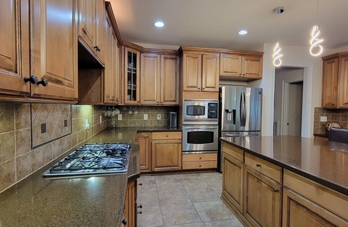 Cary House | Luxury Cary Retreat with Koi Pond & Prime Location