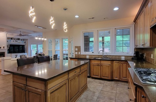 Cary House | Luxury Cary Retreat with Koi Pond & Prime Location