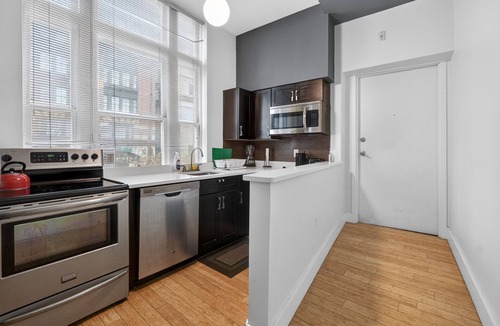 Downtown Baltimore Condo | Modern Corner 1BR w/Views | Near Harbor & Stadium