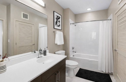 Rockville Apartment | Modern Luxe Apt in Downtown Crown. Pool Gym Walkable