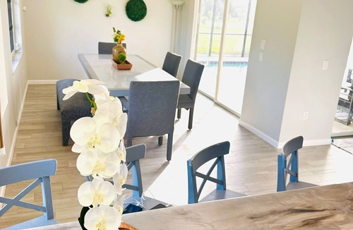Rotonda Lakes House | Modern luxury Beach house w/free heated pool seating in half acre lot and canal