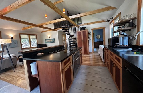 Isle of Springs Cottage | Modern woodland privacy with ocean, trails, and lobster all in walking distance.