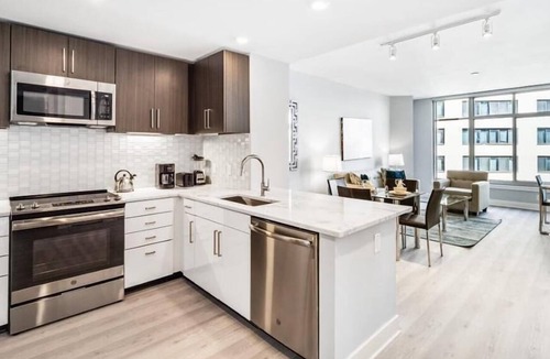 Woodmont Triangle Apartment | Near Bethesda Station | Balcony & Rooftop Terrace | McCrillis Gardens Nearby | by GLS