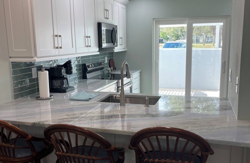 Plantation Villa | NEW, NEW, NEW! Super inviting sunshine filled Villa on Golf Course in Venice, FL
