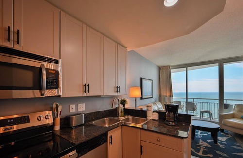 Downtown Myrtle Beach Condo | Newly Renovated Ocean Front Condo, Modern Deco, Central MB 50” Smart TV,