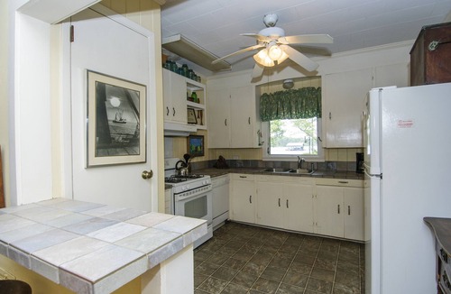 Perdido Beach Cottage | nnCharming Waterfront Retreat on Palmetto Creekn