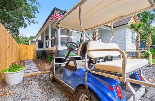 Tranquil Harbour House | Oak Island Lux Cottage Fenced Yard & Heated Pool