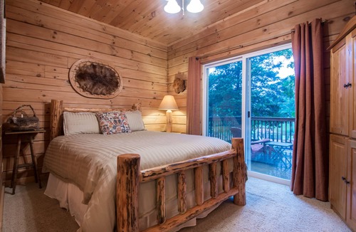 Branson Cedars Cabin | Overlooking pool & playground, walking distance to Thunder Ridge Arena.