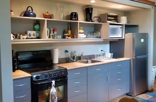 Balfour Apartment | Peaceful and private suite. Close to ferry landing and Kokanee Provincial Park.