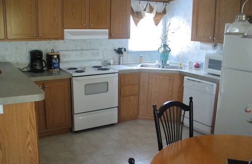 Ocean Isle Beach Cottage | Pet friendly, 3 bedroom, 2 bath, 2 piers, boat ramp, large porch, yard, waterway