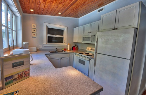 Uptown - Upper Duval Cottage | Pete's East Cottage: Cypress east cottage steps from Duval