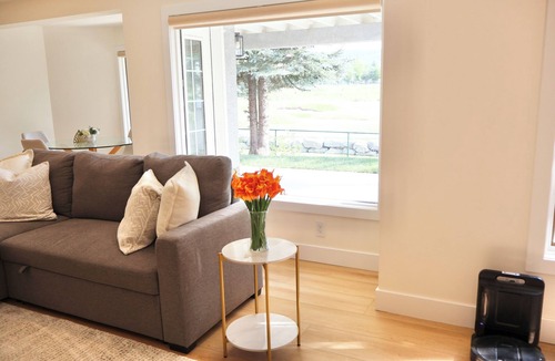 Valley Ridge House | Pond View 2 Bedroom Walkout Basement Suite on Golf Course with Fireplace & Sauna