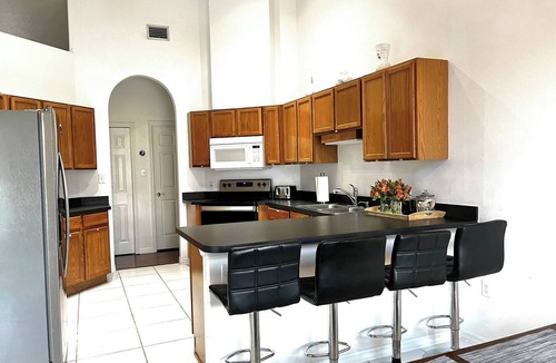 Del Real Townhouse House | Pool Paradise with hot tub, bikes, every beach need, games and more!