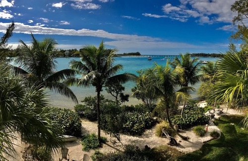 Whitney Beach House | Private Island Retreat with Private Beach, Dock, Palm Trees & Glorious Sunsets