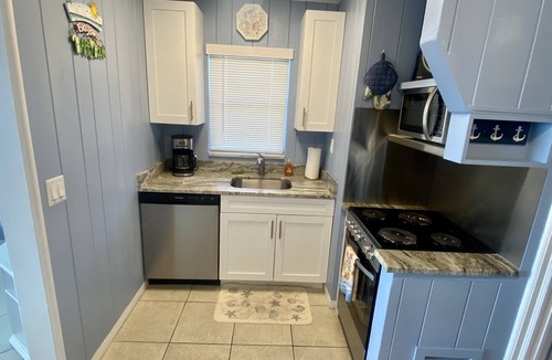 Indian Shores Cottage | Rare Direct Beachfront Cottage Ground-Floor Walk-Out to the Sand No Stairs!