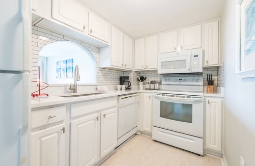 Avon By The Sea Condo | Relax in this Beachside Beauty with Oceanfront Heated Pool and Rooftop Deck