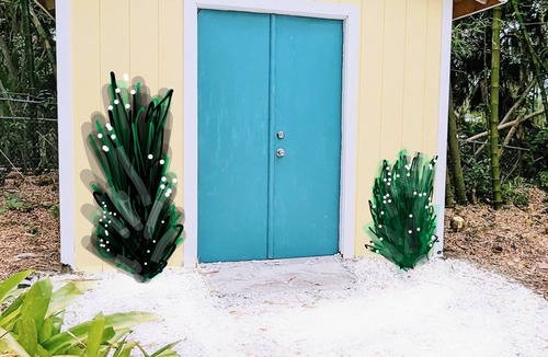 South Sarasota Cottage | Remodeled dreamy beach cottage 5 minutes to Siesta Key in lush tropical setting.