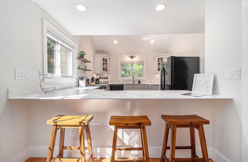 Manistee Cottage | Remodeled Home Near Lake MI, Fire Pit