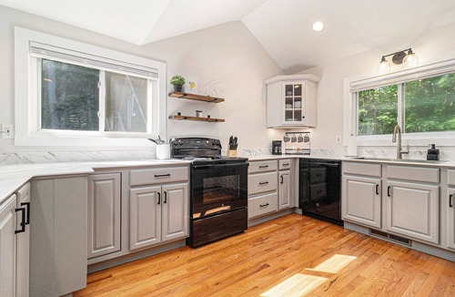 Manistee Cottage | Remodeled Home Near Lake MI, Fire Pit