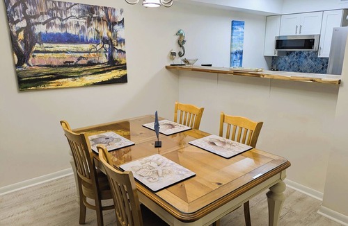 Saint Helena Island Condo | Resort access & golf cart. See reviews. On canal. Short walk to beach. <week-ask