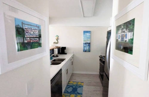 Saint Helena Island Condo | Resort access & golf cart. See reviews. On canal. Short walk to beach. <week-ask