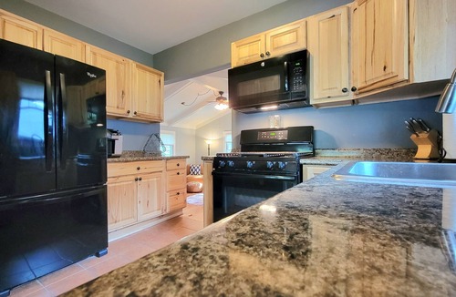 McHenry House | Riverfront Charmer with Character & Entertainment