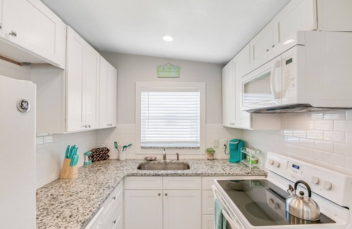Orlando Beach Apartment | RIVERFRONT community in COCOA BEACH with short walk to the beach!