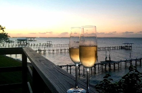 Bacliff Cottage | Romantic Open-Concept Couples Suite with Private Jacuzzi & Balcony Views in Bacliff, Texas