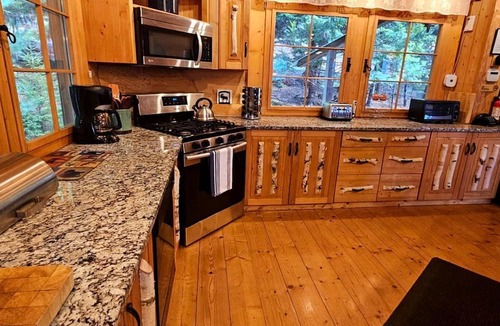 Beaver Cove Cabin | Rustic Luxury Retreat with Panoramic Lake & Mountain Views in Beaver Cove, Maine