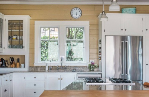 East Queen Anne House | Skyline Craftsman with Panoramic City, Space Needle, and Water Views.