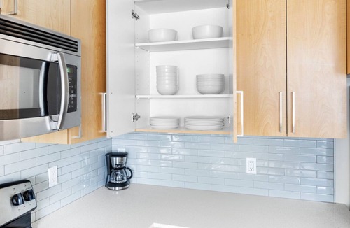 Old Ballard Apartment | Sleek Ballard 1BR w/ Rooftop Deck & Yoga, walk to Dining, by Blueground
