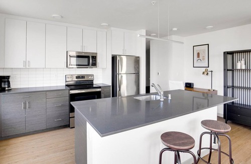 Columbia City Apartment | Sleek Columbia City 2BR w/ W/D & Gym, steps to Light Rail, by Blueground