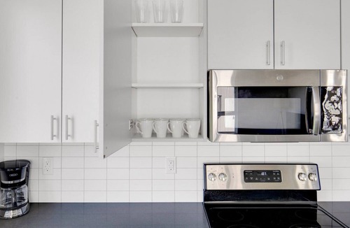 Columbia City Apartment | Sleek Columbia City 2BR w/ W/D & Gym, steps to Light Rail, by Blueground