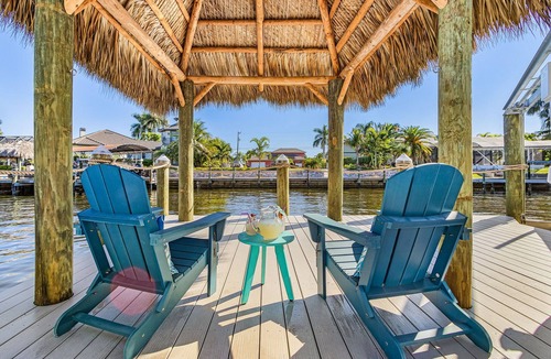Pelican Villa | Sophisticated 3 BR waterfront Villa with heated pool, hot tub, kayaks, dock and tiki hut