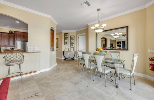 Titusville House | Space Coast Luxury Estate with Heated Infinity Pool, Hot Tub & Fitness Center