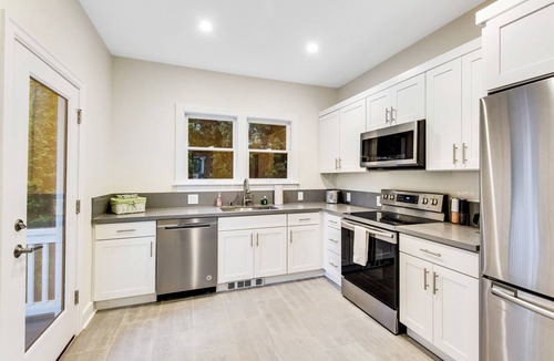 Wallingford House | Spacious home with fenced yard, patio, & sunroom - near UW/Green Lake