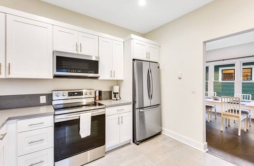Wallingford House | Spacious home with fenced yard, patio, & sunroom - near UW/Green Lake
