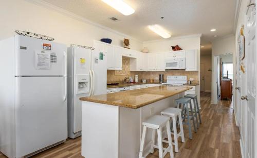 North Myrtle Beach House | Stunning and Spacious 5 BR Condo- With Ocean Views and more! Cherry Grove Villas 402