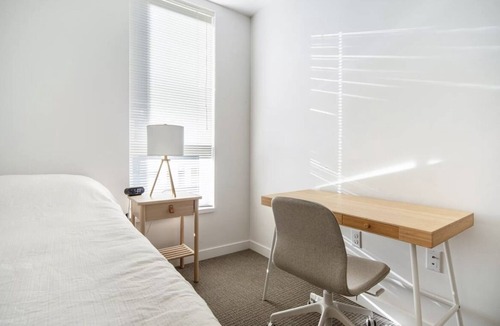 Wilburton Apartment | Stylish 2BR: City Views, Dual Workspaces & Gym Access